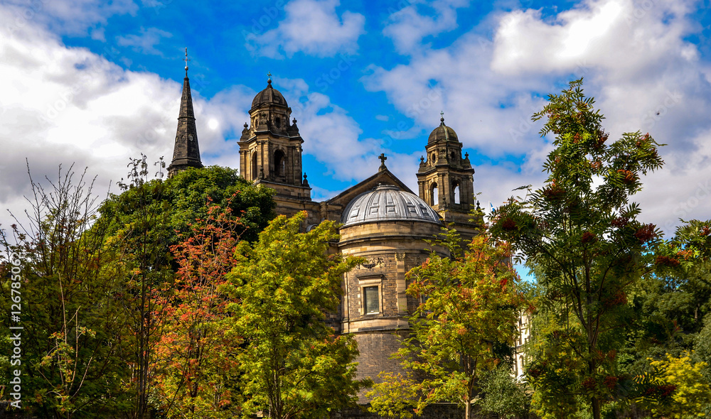 St Cuthbert's Church in Scotland. Princes Street Gardens in Edinburgh.