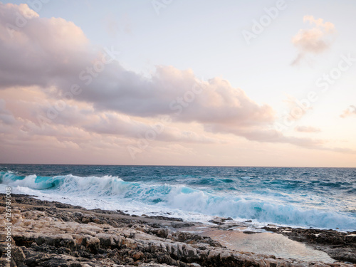 waves crashing on the rocks © smoxx