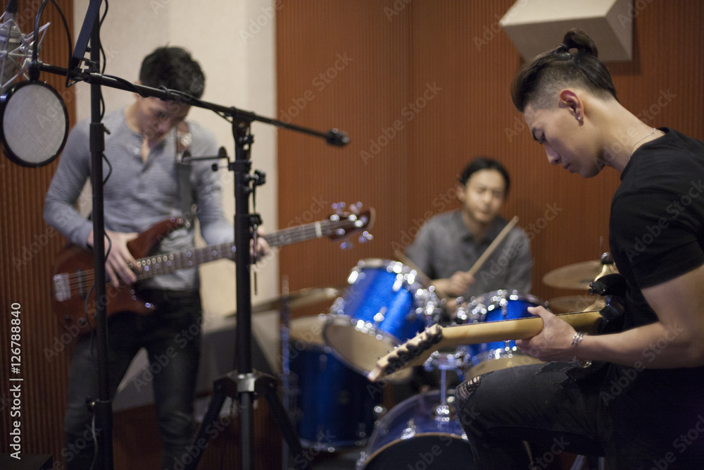Musical band in recording studio Musical band in recording studio