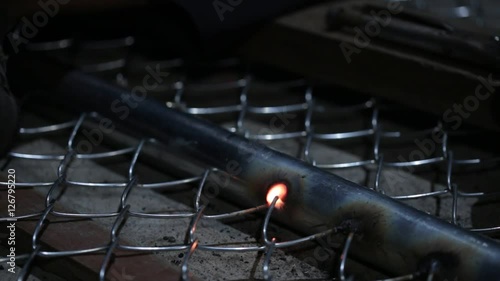 Welder works in the dark 