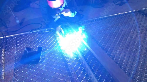 Welder works in the dark 