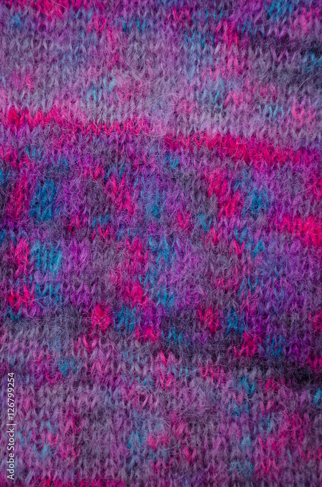 Handknitted fabric of colored mohair yarn