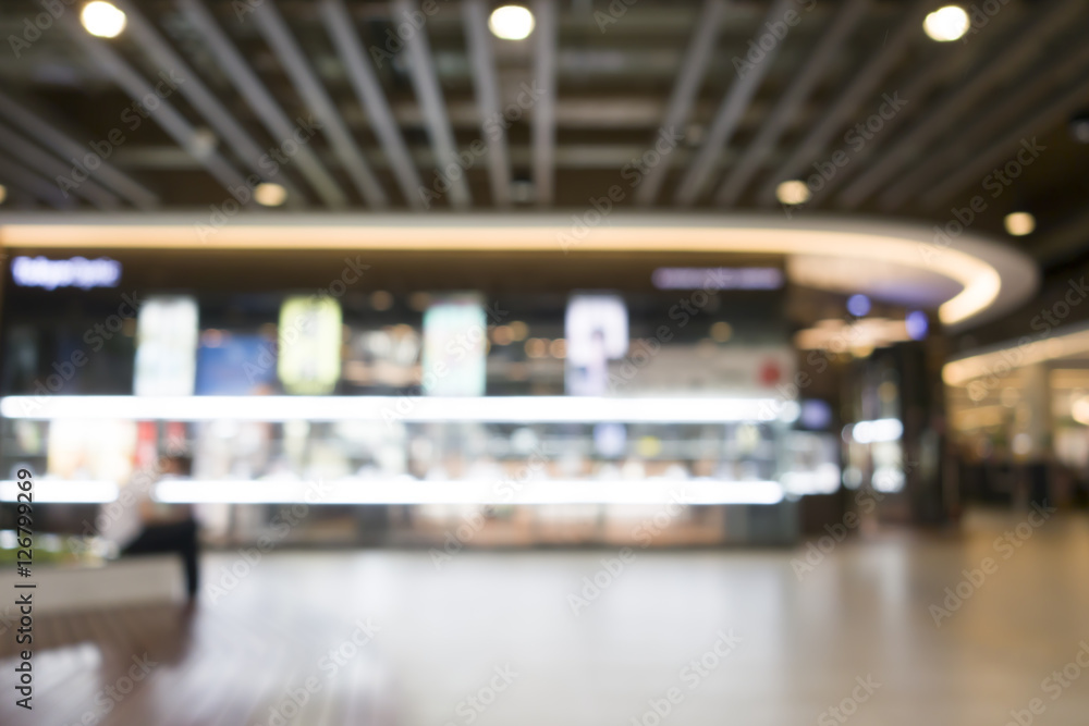 blur image of shopping mall and people with abstract bokeh