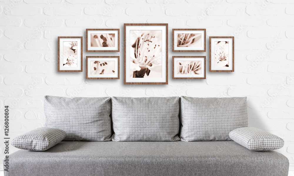 Interior decor mock up. Frames collage with floral posters on bricks  textured wall, over modern couch. Stock Photo | Adobe Stock