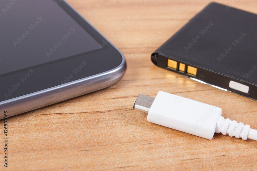 Mobile phone, plug of charger and telephone battery, smartphone charging Mobile phone, plug of charger and telephone battery, smartphone charging