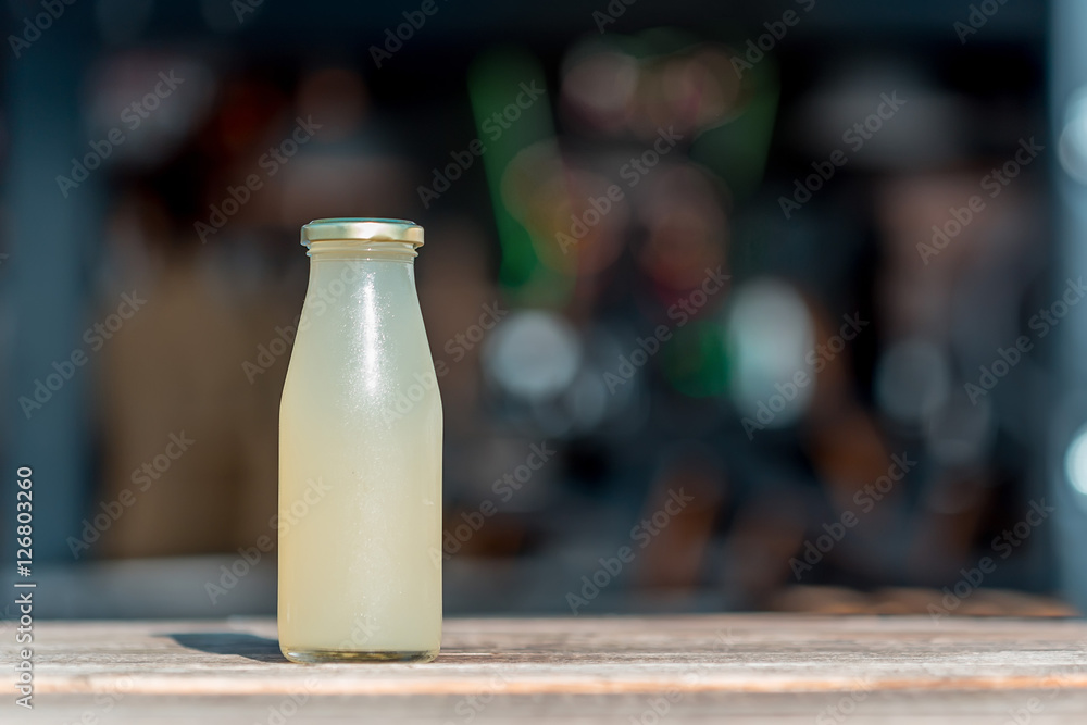 Raw melon juice in glass bottle Raw melon juice in glass bottle