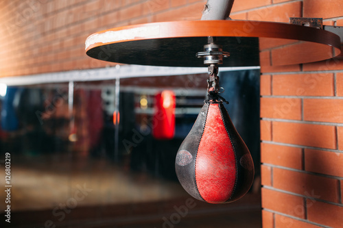 Black and red punching bag. 