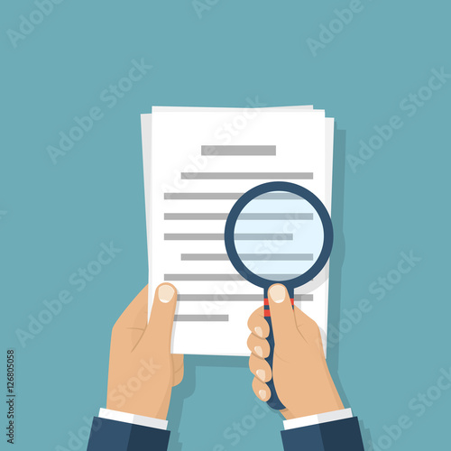 magnifier and paper document