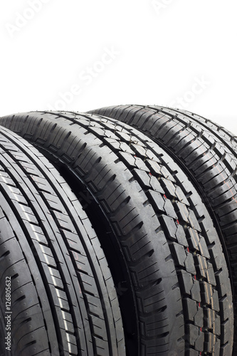Car tires background in a row on white background. rubber © nayladen