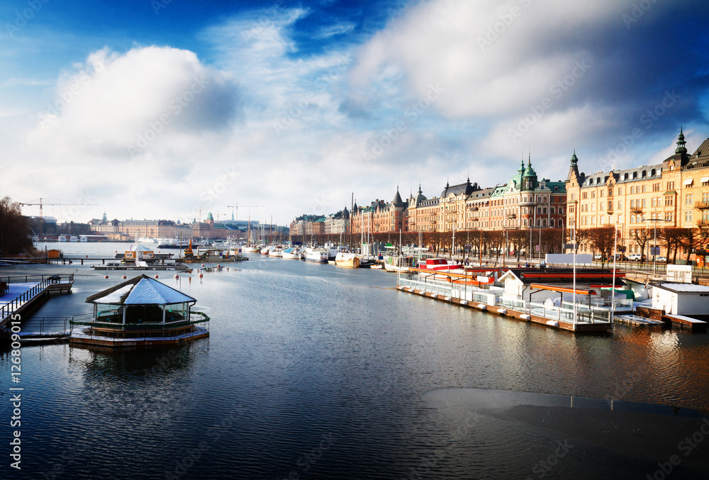 Scenic waterfront panorama of Stockholm city, Sweden, toned