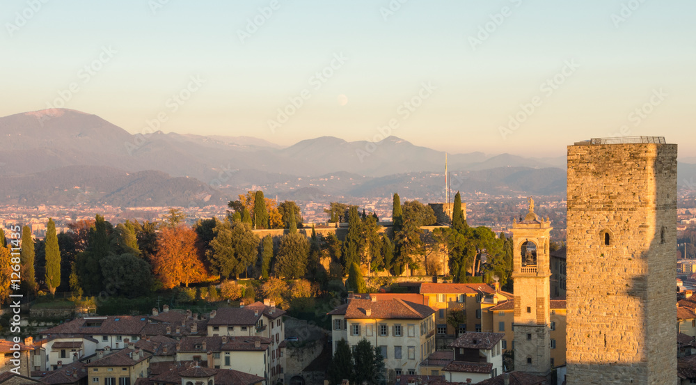 Bergamo - Old city (Citta Alta). One of the beautiful city in Italy. Lombardia. Evening sunset. Landscape on the old city, clock towers and the fortress