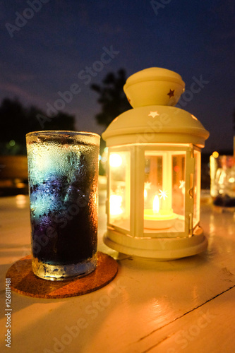 Butterfly Pea juice with Candle in Lamp