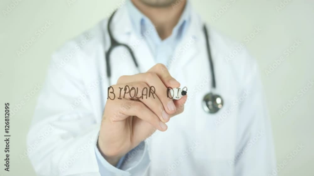 Bipolar disorder , Doctor Writing On Transparent Screen Bipolar disorder , Doctor Writing On Transparent Screen