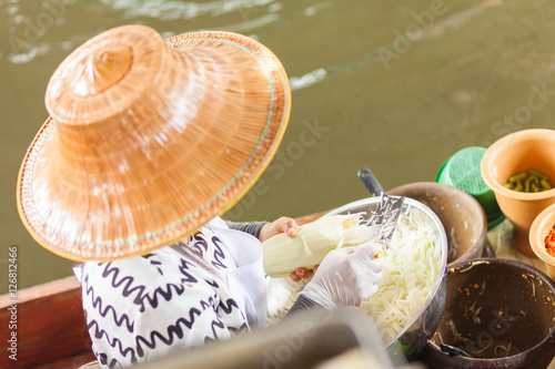 Thai woman preparing food photo