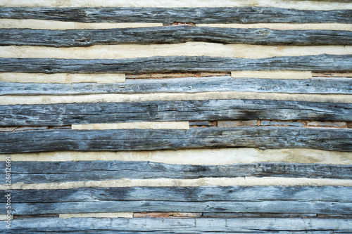 the wall of an old wooden cabin as a horizontal background