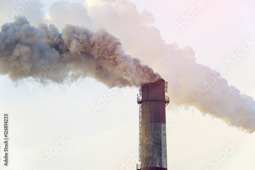 Fotografie Smoking pipes of thermal power plant emitting carbon dioxide