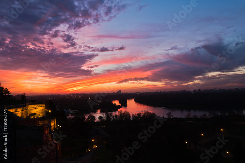 Dramatic colorful sunset over confluence of Danube and Sava river in Belgrade, Serbia © banepetkovic
