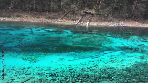 Colorful lake at Jiuzhaigou National Park  lake,  The UNESCO World Heritage in Sichuan , China in  Autumn  in November  located in  in  Tibetan-Qiang of Sichuan ,China
