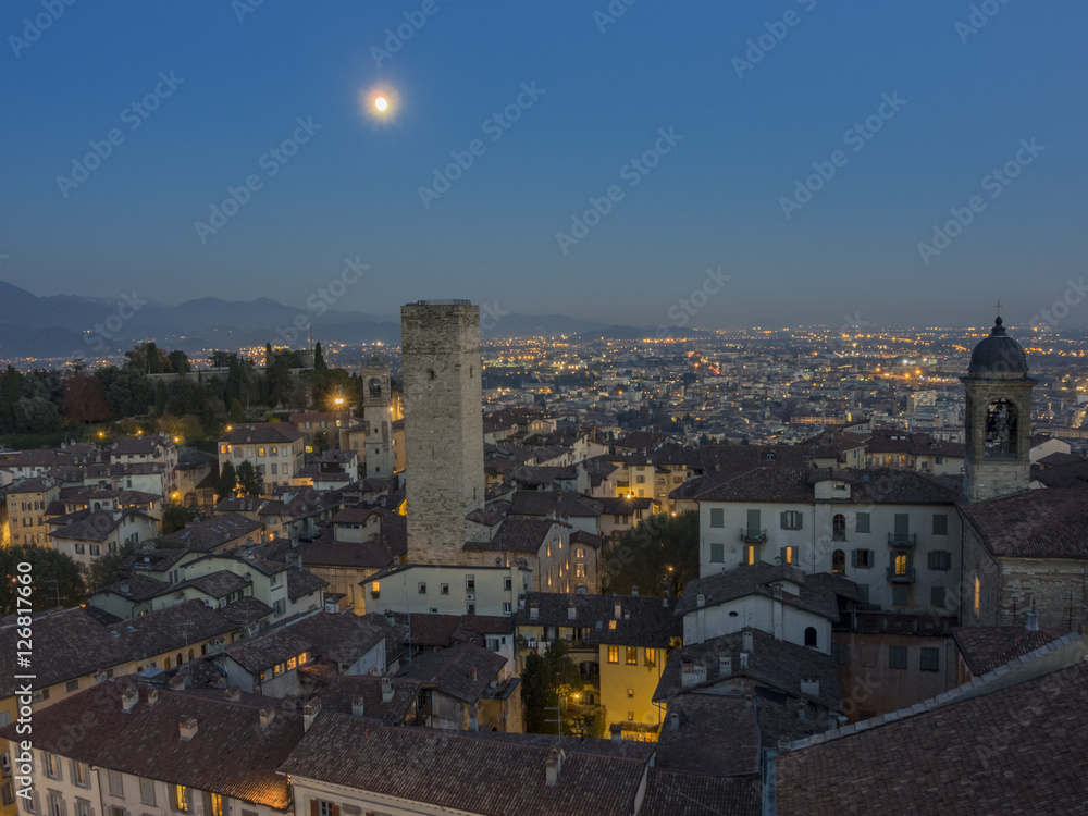 Bergamo - Old city (Citta Alta). One of the beautiful city in Italy. Lombardia. Evening sunset. Landscape on the old city, clock towers and the fortress