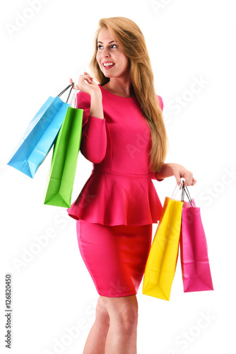 Young woman with shopping bags isolated on white