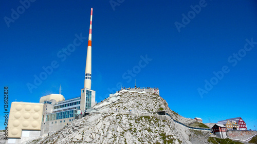 the cable car and weather station at the peak of Saentis mountain in the Swiss Alps