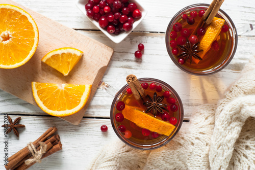 Cup of hot tea with fruit and spices.