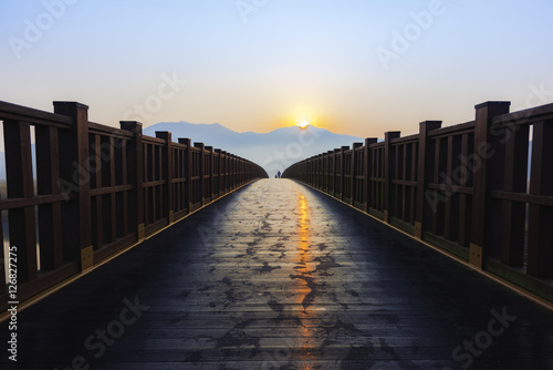 Sunrise  on Wooden Bridge © chanchai