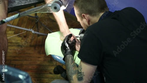 Tattoo is put by master