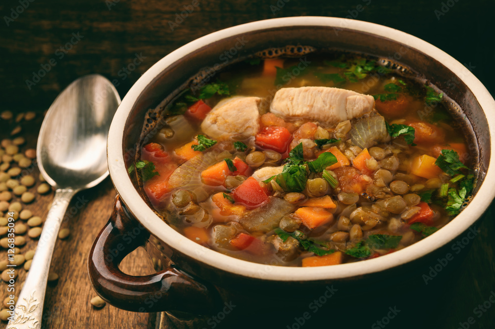 Hot soup with green lentil, chicken, vegetables and spices. Hot soup with green lentil, chicken, vegetables and spices.