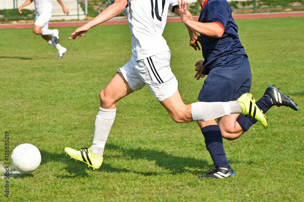 Obraz premium Soccer players running