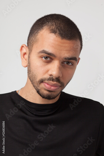unretouched close up portrait of attractive black young man