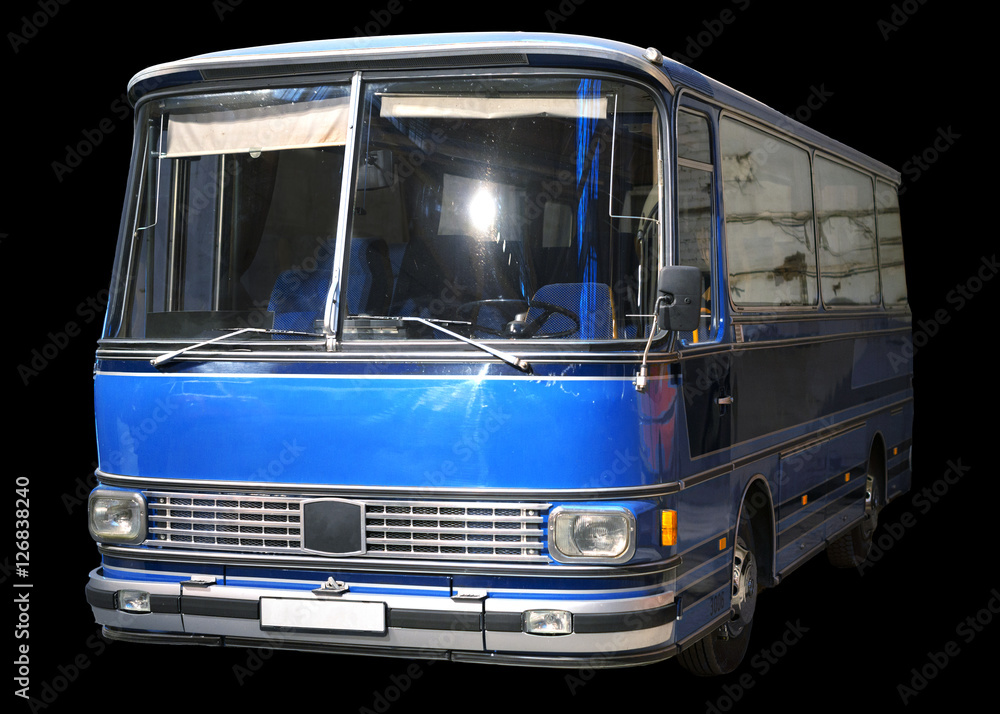 Old retro blue bus. Isolated on black background.