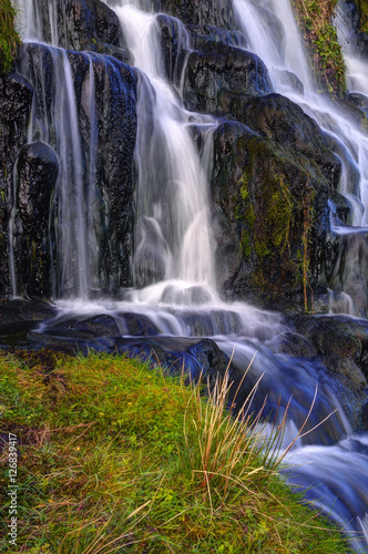 Fototapeta Naklejka Na Ścianę i Meble -  Waterfall near Old Man of Storr
