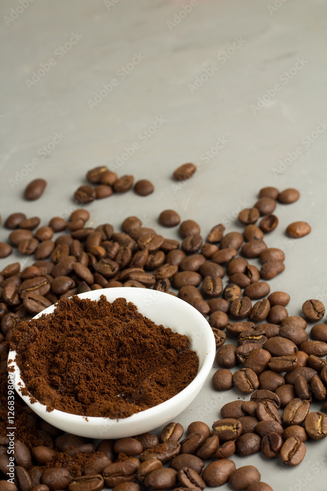 ground coffee in a white plate ground coffee in a white plate