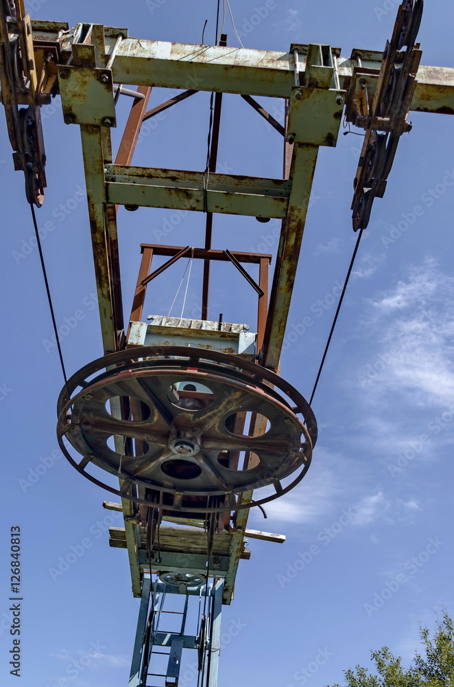 Old ski tow or lift in sunny day with blue sky toward Cherni vrah peak, Vitosha Mountain, Bulgaria Old ski tow or lift in sunny day with blue sky toward Cherni vrah peak, Vitosha Mountain, Bulgaria