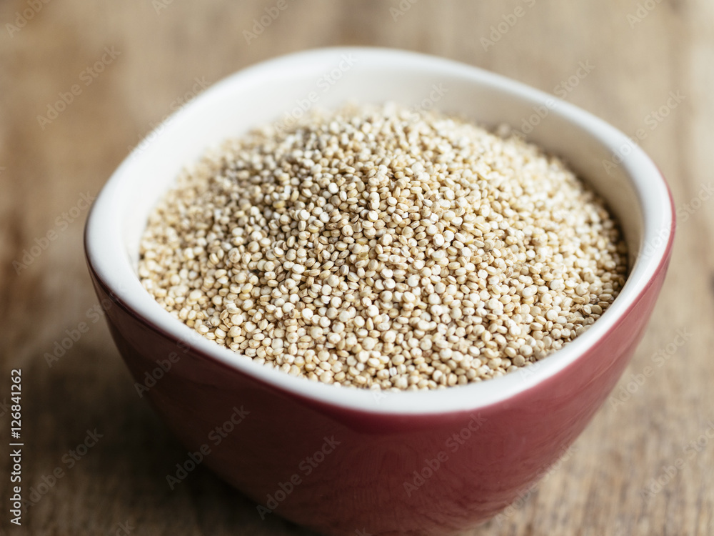 White quinoa in a small bowl White quinoa in a small bowl