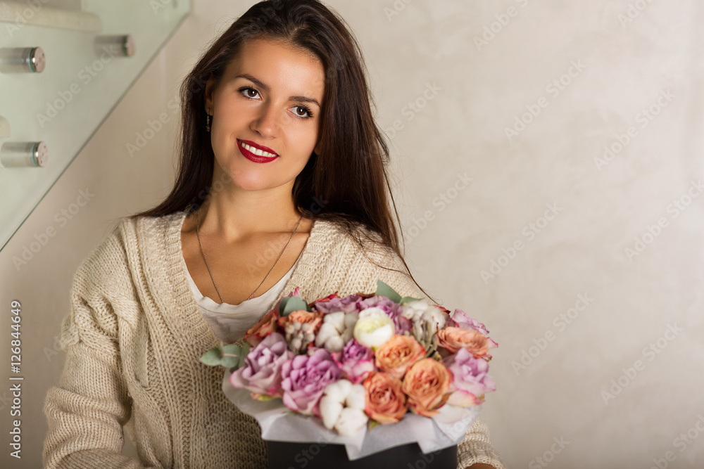 Pretty young woman with a bouquet Pretty young woman with a bouquet