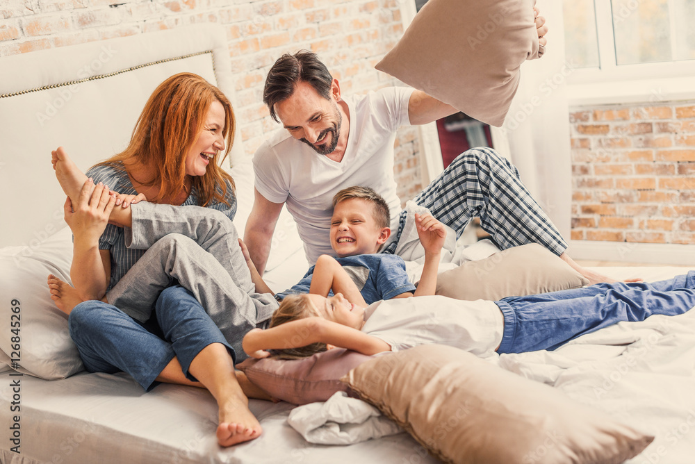 Young family being playful at home