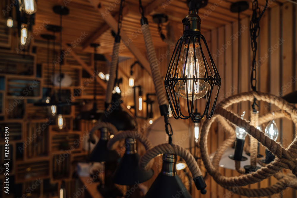 Modern fashion lamp Edison interior loft room. Lantern with filament.