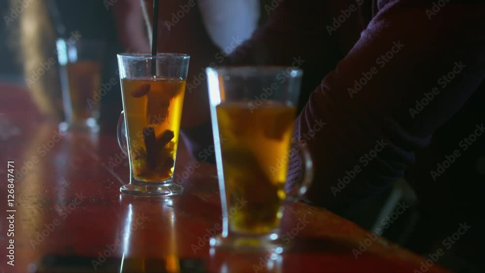 Group of friends having a drink in a modern cafe. 4K UHD RAW edited footage