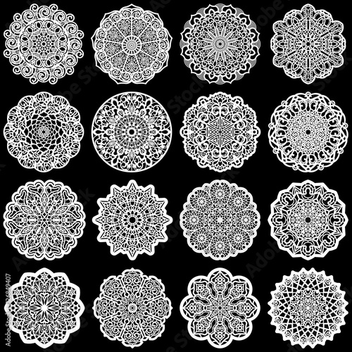 Large  set of design elements, lace round paper doily, doily to decorate the cake, template for cutting, greeting element,  snowflake, laser cut;  vector illustrations