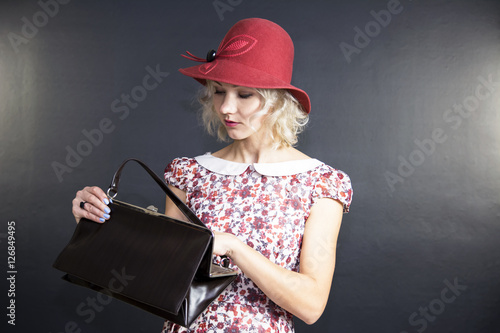 cute young blond woman in a hat