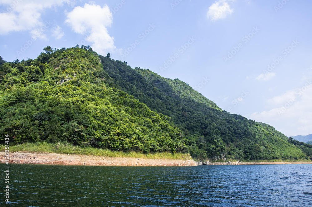 The lake and mountains scenery with blue sky