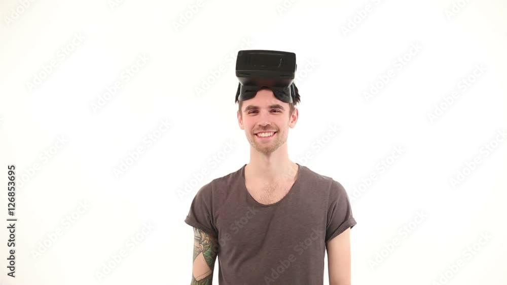 Smilling man enjoys VR Smilling man enjoys VR