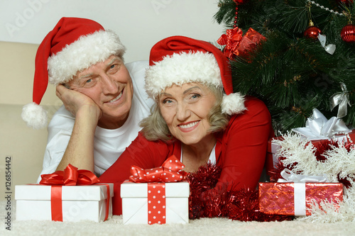Senior couple celibrating Christmas  photo