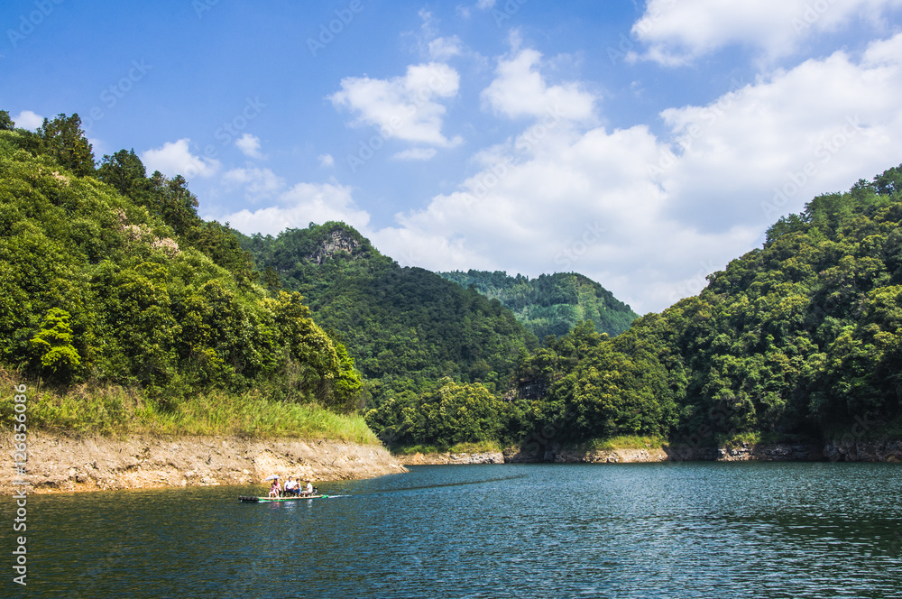 The lake and mountains scenery with blue sky The lake and mountains scenery with blue sky