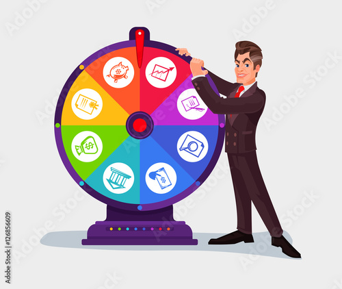Business man spinning the wheel of fortune