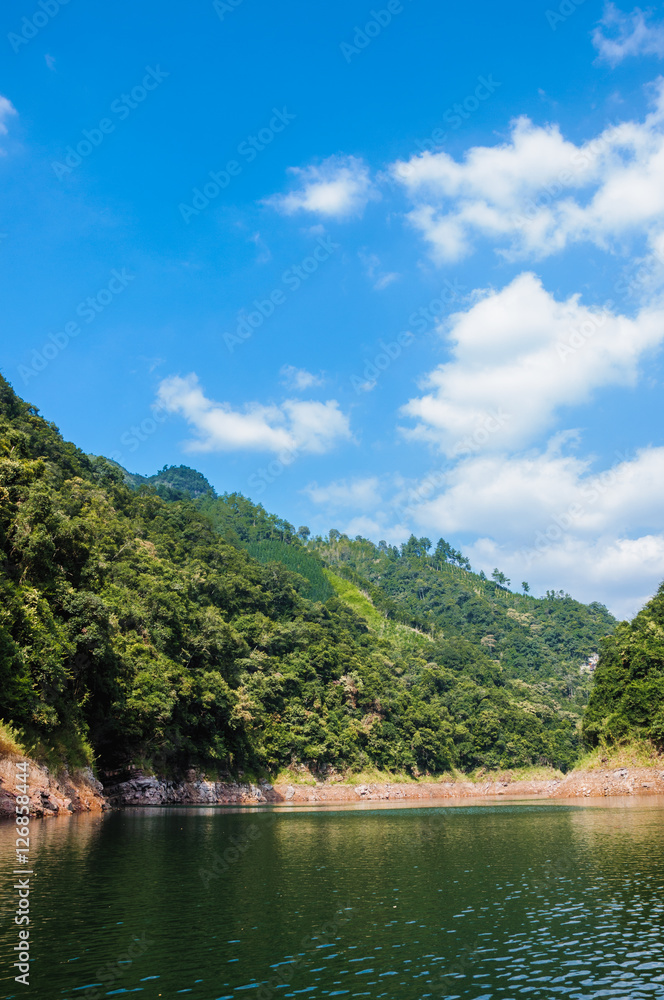 The lake and mountains scenery with blue sky The lake and mountains scenery with blue sky