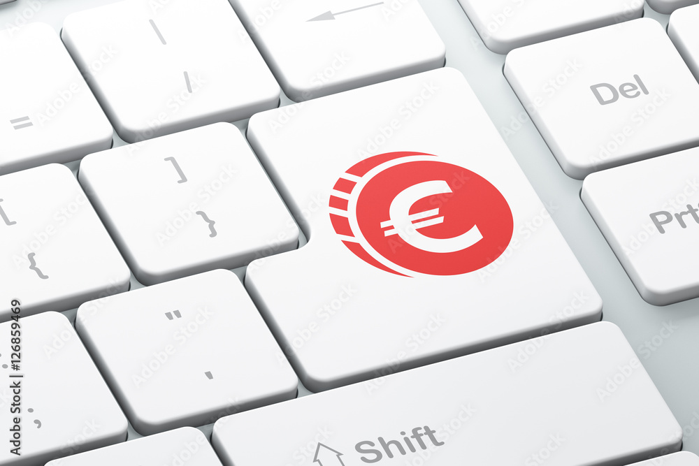 Currency concept: Euro Coin on computer keyboard background Currency concept: Euro Coin on computer keyboard background
