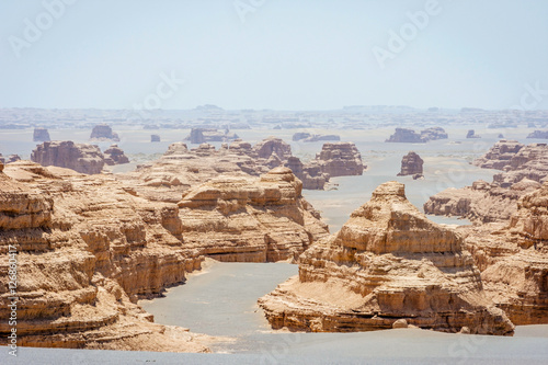 Rock formations in Dunhuang Yardang National Geopark, Gobi Desert, China photo